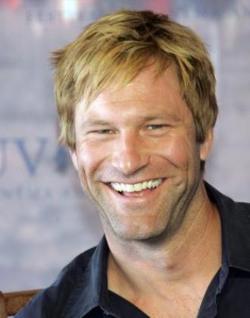 Aaron Eckhart to Protect us from Aliens